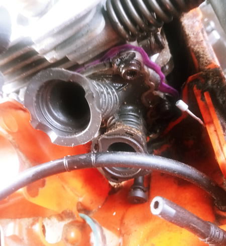 Carb boot over silicone blocking the port.